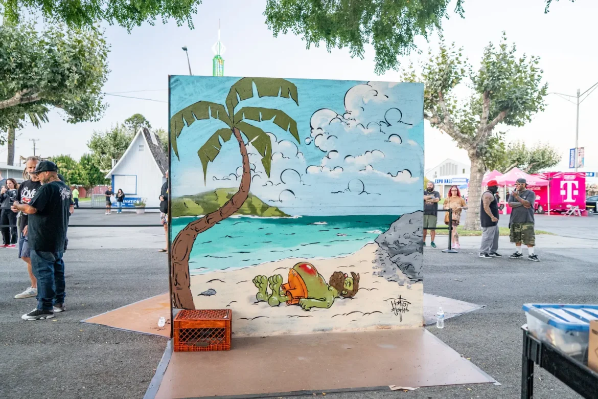 A beach and palm tree mural brightens the walkway.