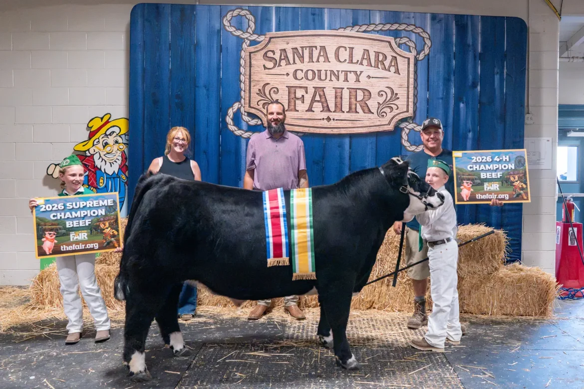 The 2026 Supreme Champion Beef and 4-H Champion Beef with the award party.